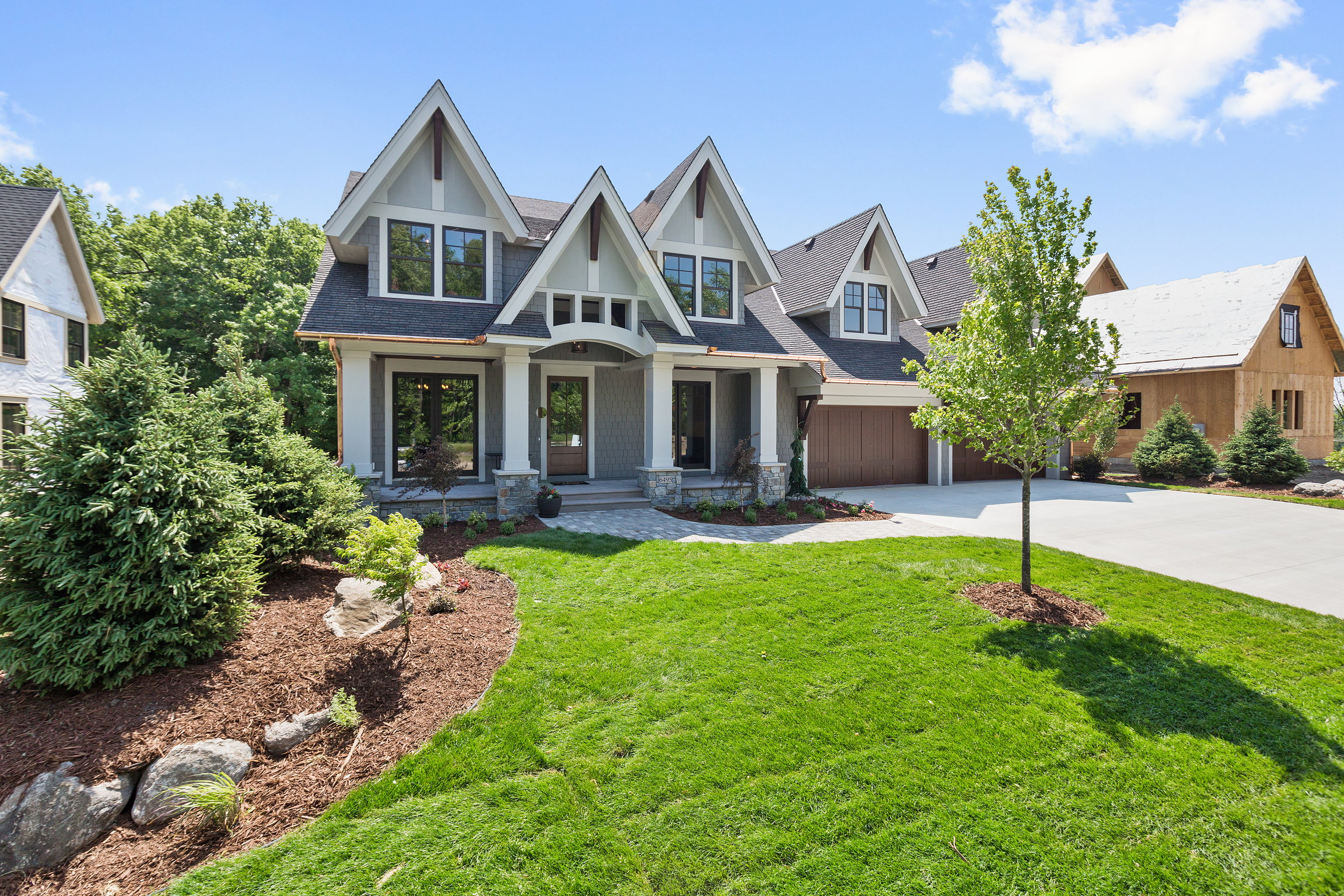 Craftsman home with immaculate landscaping